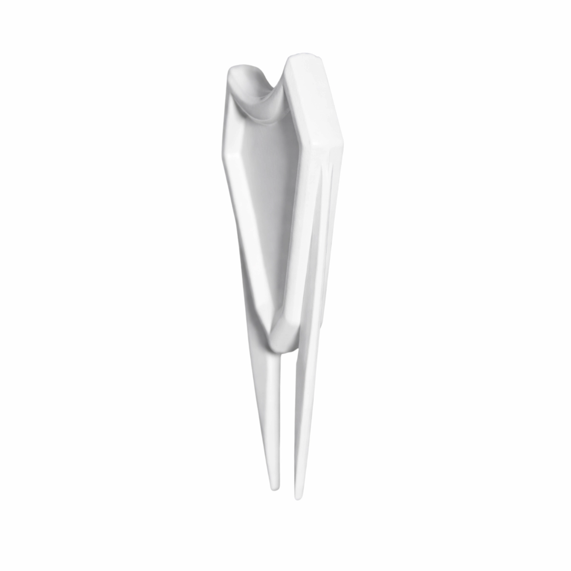 Angled view of Birdie Chaser white divot repair tool showing dual-prong design
